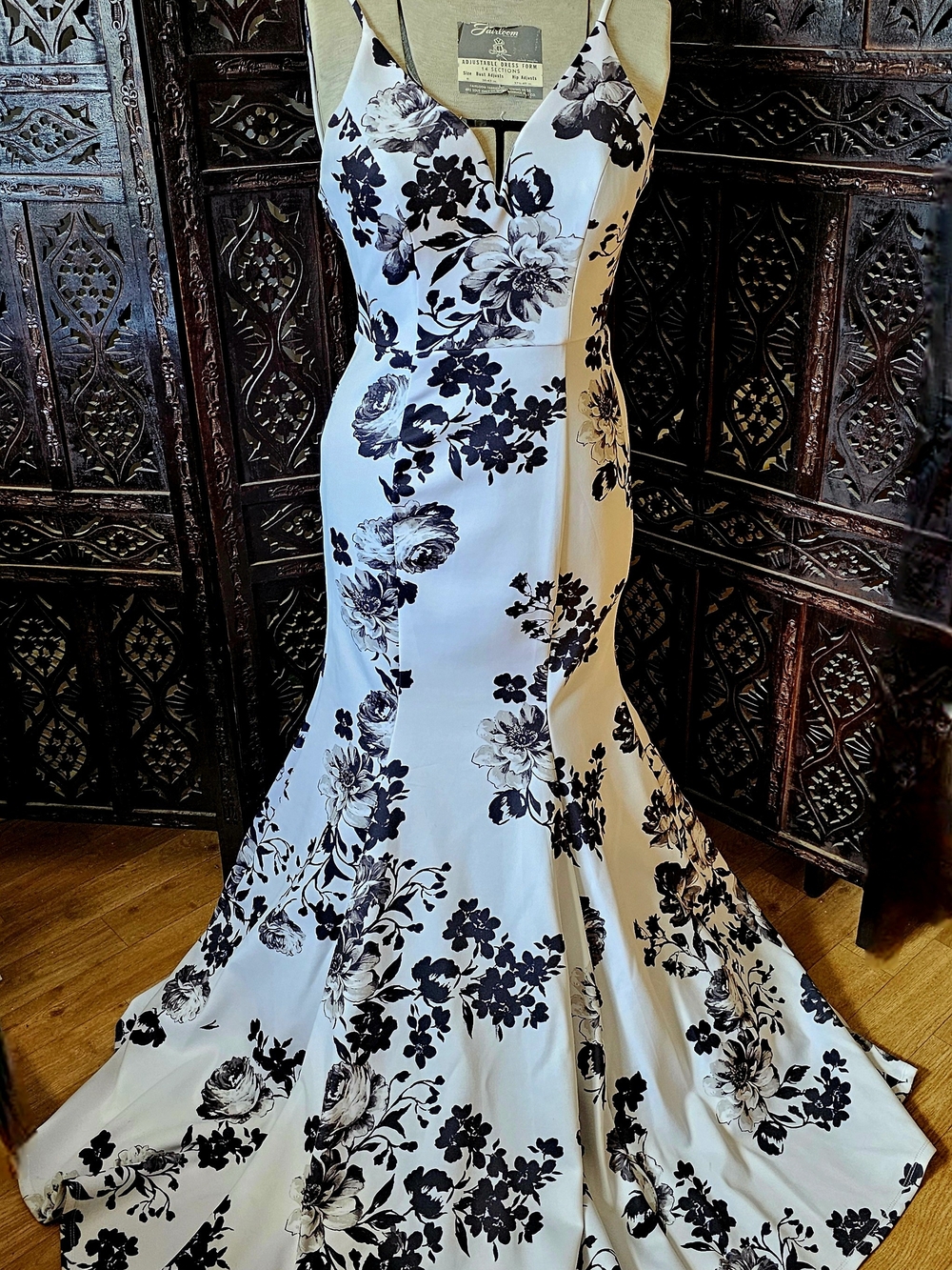 B. Smart White Maxi Dress with Black Floral Print